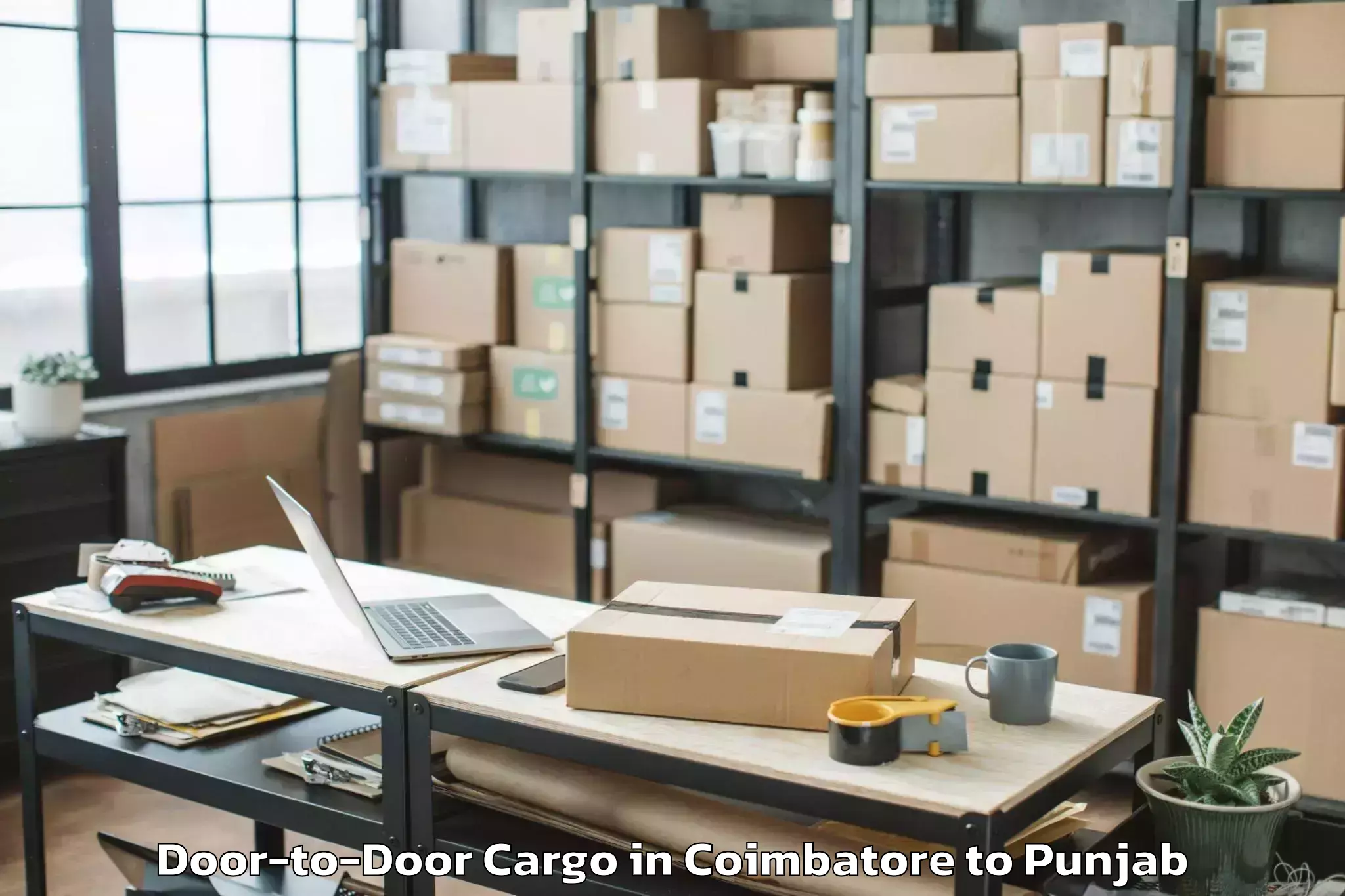 Reliable Coimbatore to Barnala Door To Door Cargo